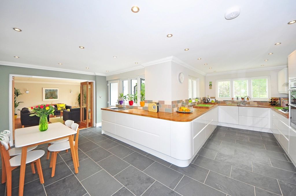 Bright kitchen with white cabinets (stock photo)